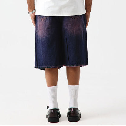 SHORT DÉCHIRÉ DELAVÉ