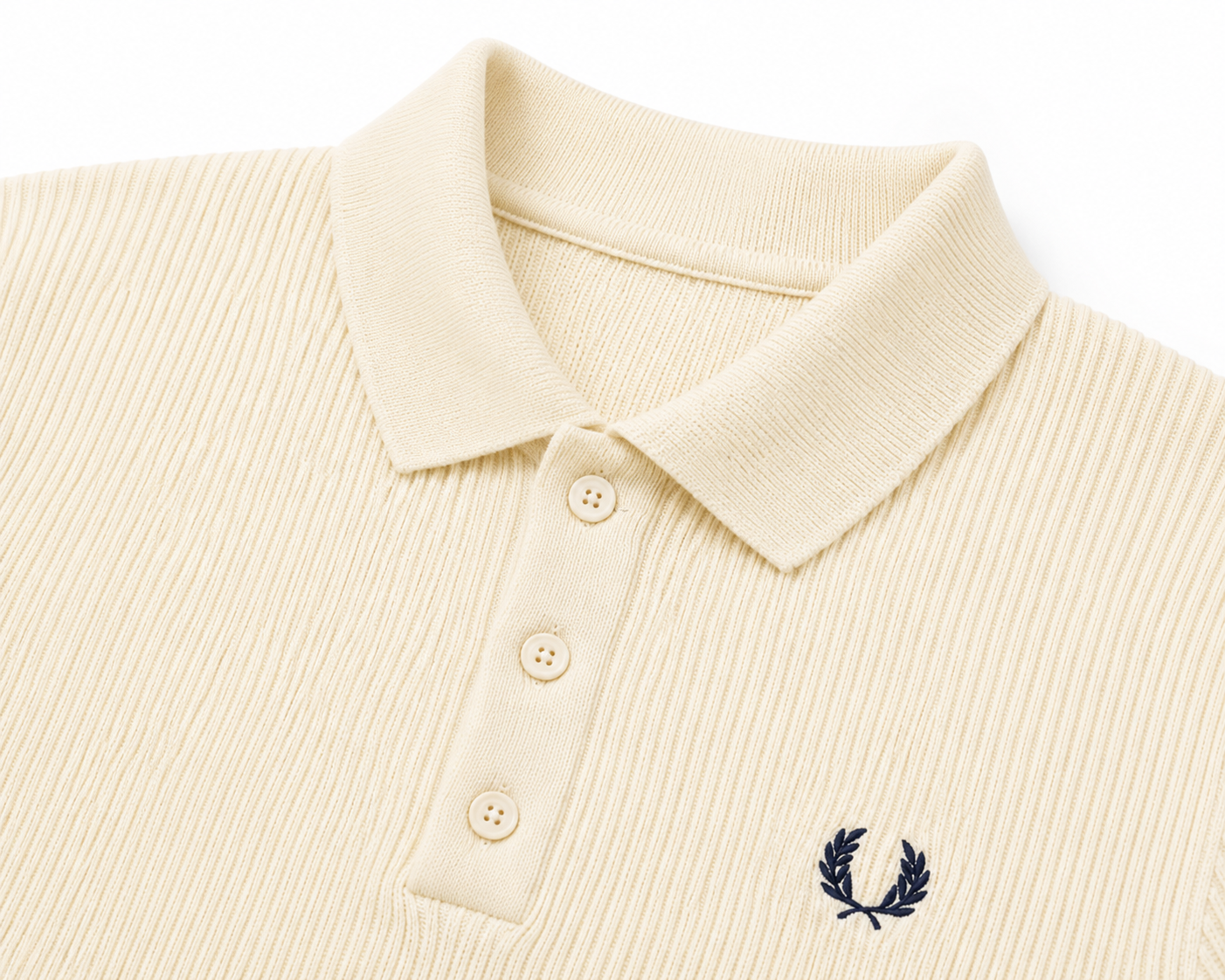 POLO TRICOT EMBLÈME BRODÉ
